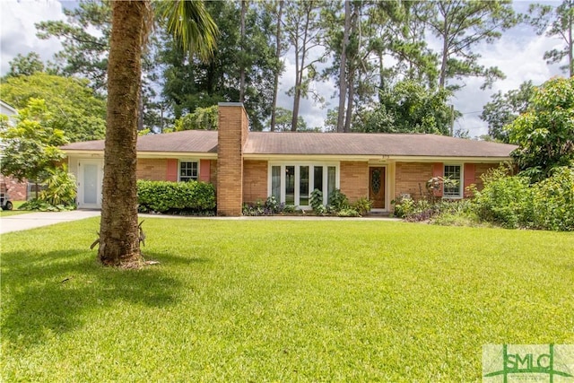 ranch-style house with a front lawn