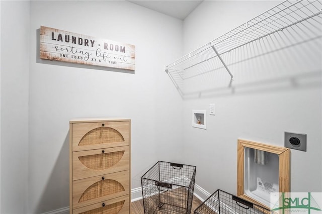 laundry room with hookup for a washing machine and hookup for an electric dryer