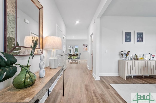 hallway featuring light hardwood / wood-style flooring