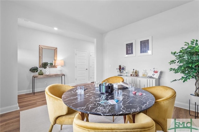 dining room featuring hardwood / wood-style flooring