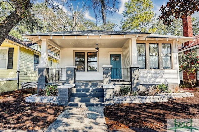 view of front of home featuring covered porch