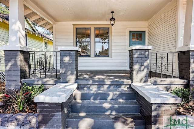 doorway to property with a porch