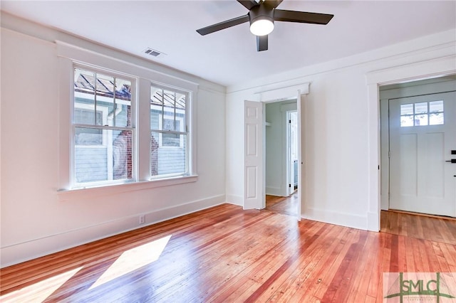 interior space with light hardwood / wood-style floors and ceiling fan