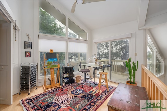 sunroom / solarium with a wealth of natural light and ceiling fan