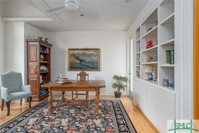 office featuring ceiling fan and light hardwood / wood-style flooring