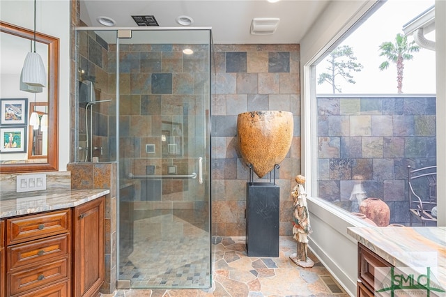 bathroom with an enclosed shower