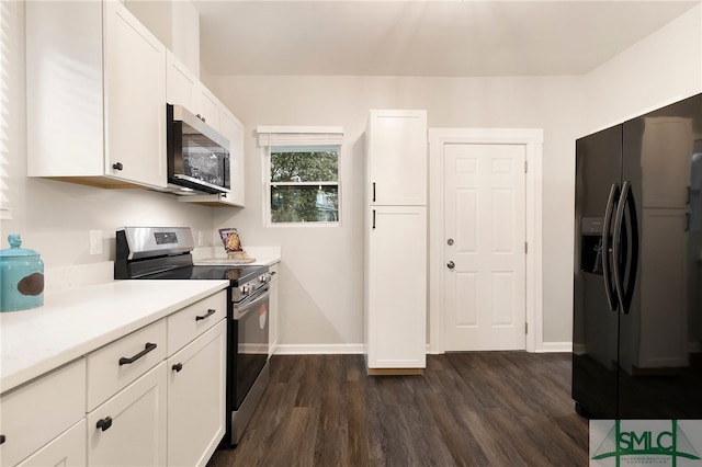 kitchen featuring stainless steel appliances, dark wood-type flooring, and white cabinets