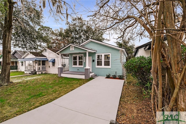 bungalow with a front lawn