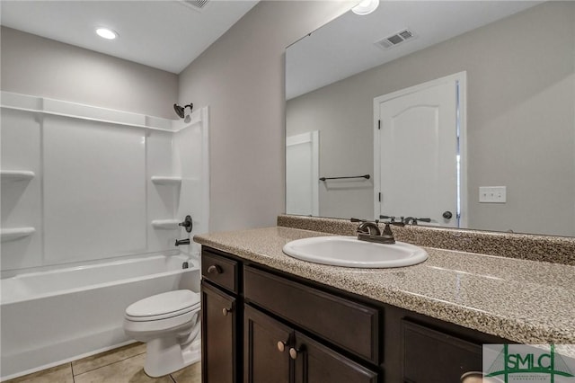 full bathroom with vanity, toilet, tile patterned floors, and  shower combination