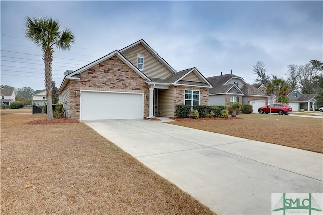 view of front of property with a garage and a front yard