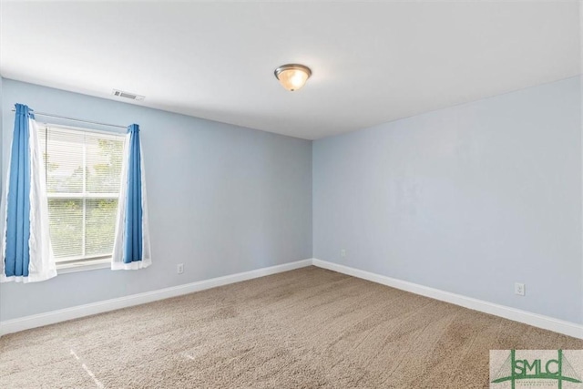 empty room with carpet floors