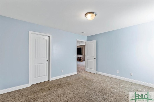 view of carpeted spare room