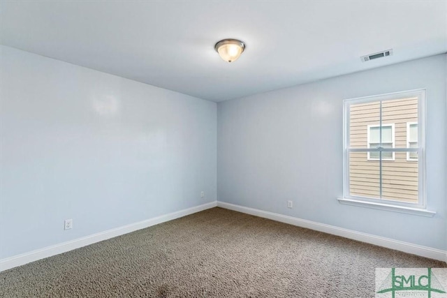 unfurnished room with carpet