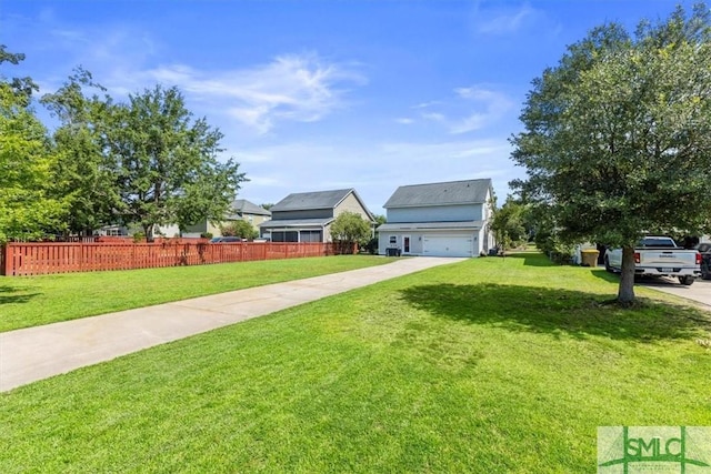 view of yard with a garage