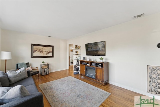 living room with light wood-type flooring