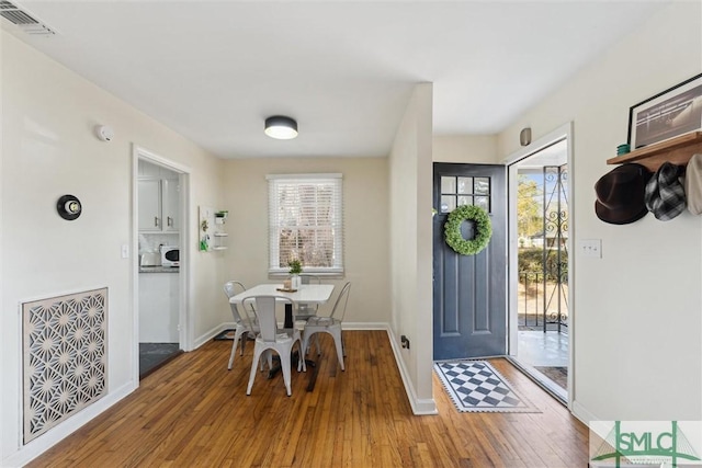 interior space with wood-type flooring and a wealth of natural light