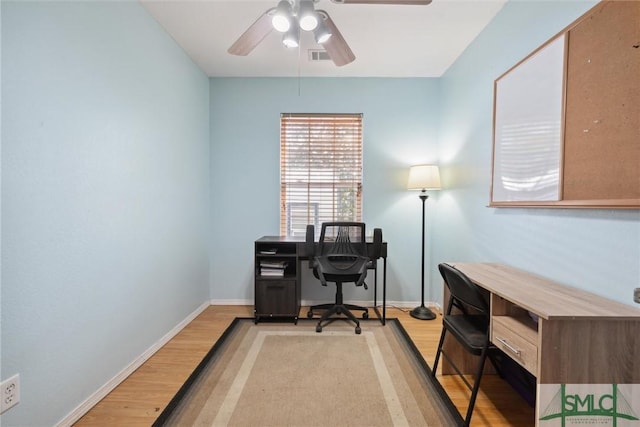 office area with hardwood / wood-style flooring and ceiling fan