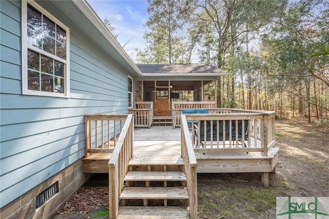 deck featuring a sunroom