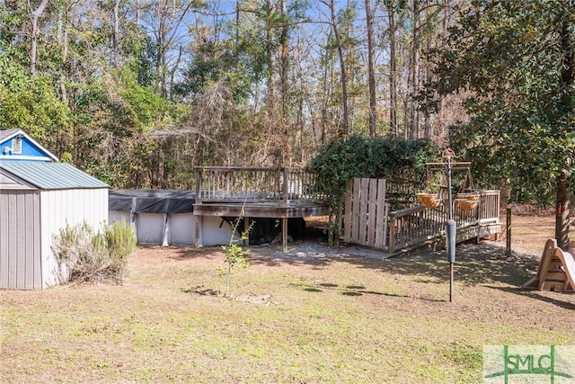 view of yard with a deck