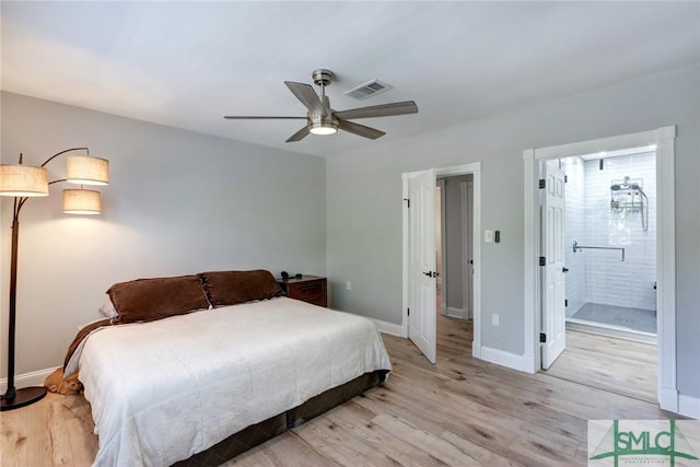 bedroom featuring ceiling fan, ensuite bathroom, and light hardwood / wood-style flooring