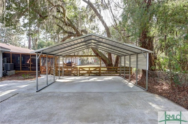 view of vehicle parking with a carport