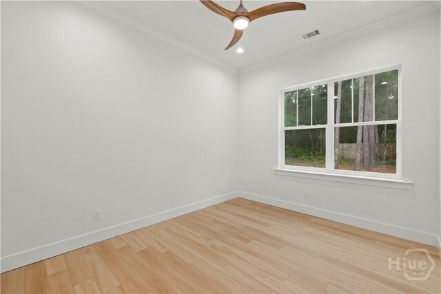 511 Goodman Dr, Midway, GA 31320 - unfurnished room featuring baseboards, light wood-style floors, ornamental molding, ceiling fan, and recessed lighting