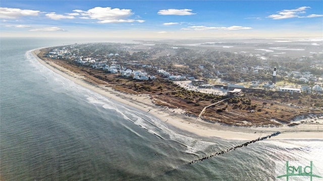 bird's eye view featuring a view of the beach and a water view