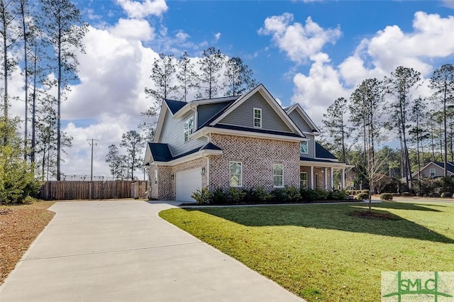 view of front facade featuring a garage and a front yard