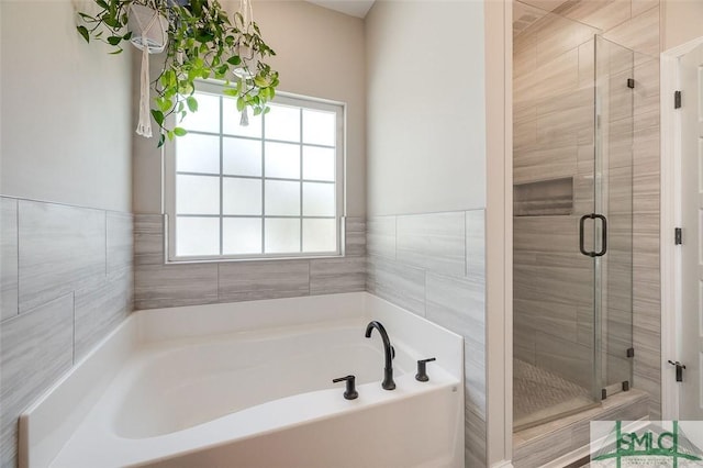 100 Sweetwater Cir, Rincon, GA 31326 - bathroom featuring independent shower and bath and a healthy amount of sunlight