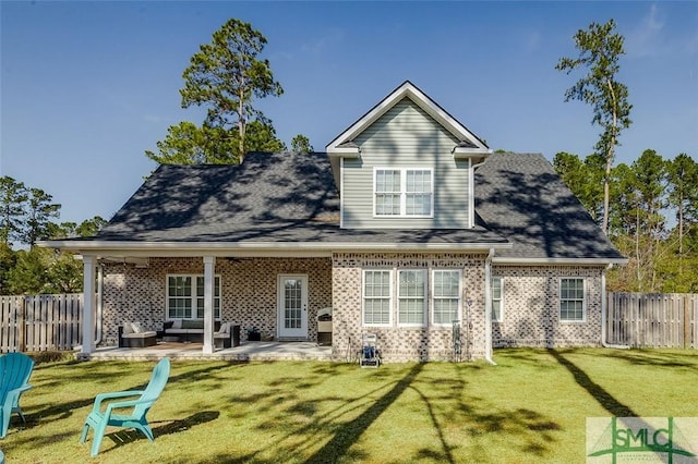 100 Sweetwater Cir, Rincon, GA 31326 - back of property featuring a yard, outdoor lounge area, and a patio area