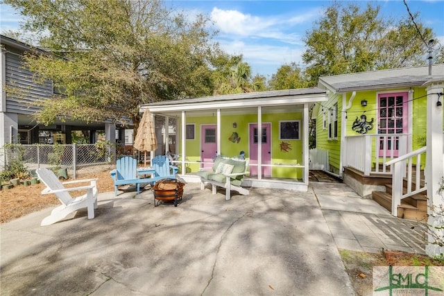 115 2nd Ave, Tybee Island, GA 31328 - view of patio / terrace featuring a fire pit
