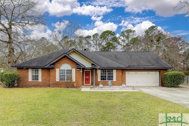 ranch-style house featuring a garage and a front yard