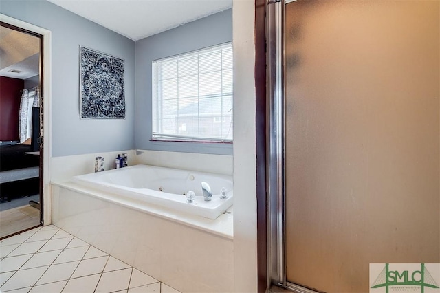 bathroom featuring tile patterned floors and shower with separate bathtub