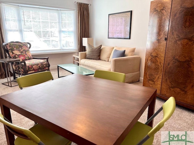 dining room featuring carpet flooring