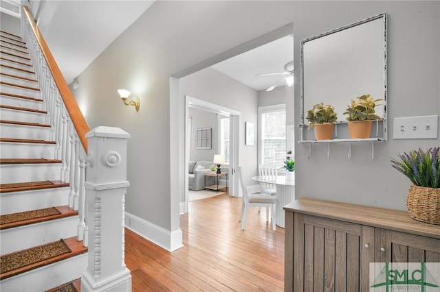 foyer featuring light hardwood / wood-style floors and ceiling fan