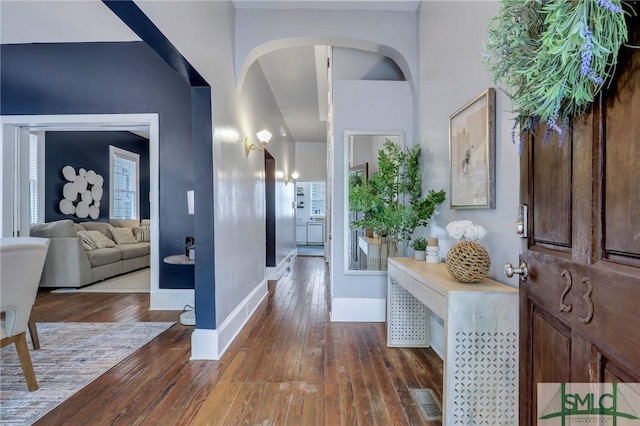 foyer entrance featuring dark hardwood / wood-style flooring