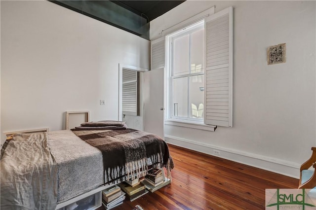 bedroom featuring hardwood / wood-style floors