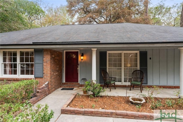 property entrance with a porch