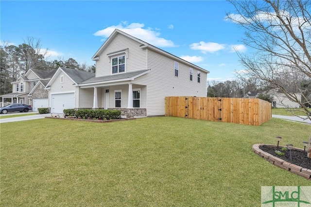 view of front of home featuring a porch, a garage, and a front lawn