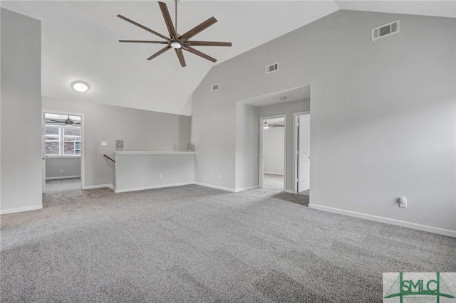 unfurnished living room featuring ceiling fan, high vaulted ceiling, and carpet