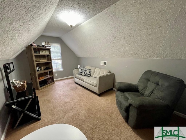 interior space featuring vaulted ceiling, light colored carpet, and a textured ceiling