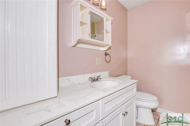 108 Stafford St, Hinesville, GA 31313 - bathroom featuring tile patterned floors, vanity, and toilet