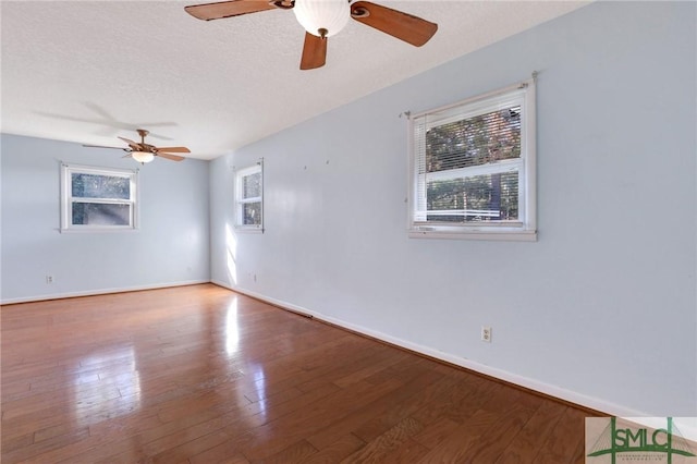 108 Stafford St, Hinesville, GA 31313 - empty room featuring ceiling fan, hardwood / wood-style floors, and a textured ceiling