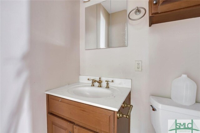 108 Stafford St, Hinesville, GA 31313 - bathroom featuring vanity and toilet
