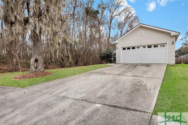 garage featuring a yard