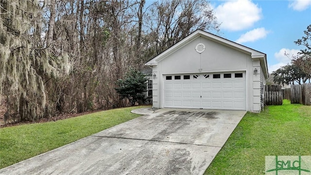 garage with a lawn