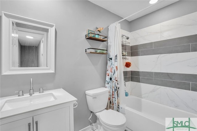 full bathroom with shower / bath combo, vanity, and toilet