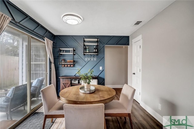 dining room featuring dark hardwood / wood-style floors