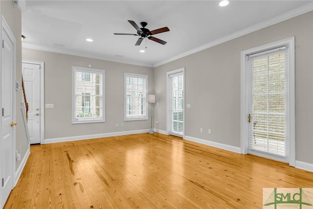 interior space featuring crown molding, ceiling fan, and light hardwood / wood-style flooring