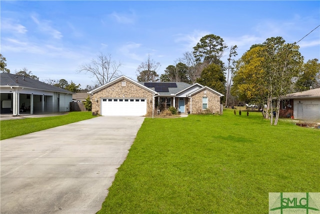 ranch-style home featuring a garage, a front lawn, and solar panels